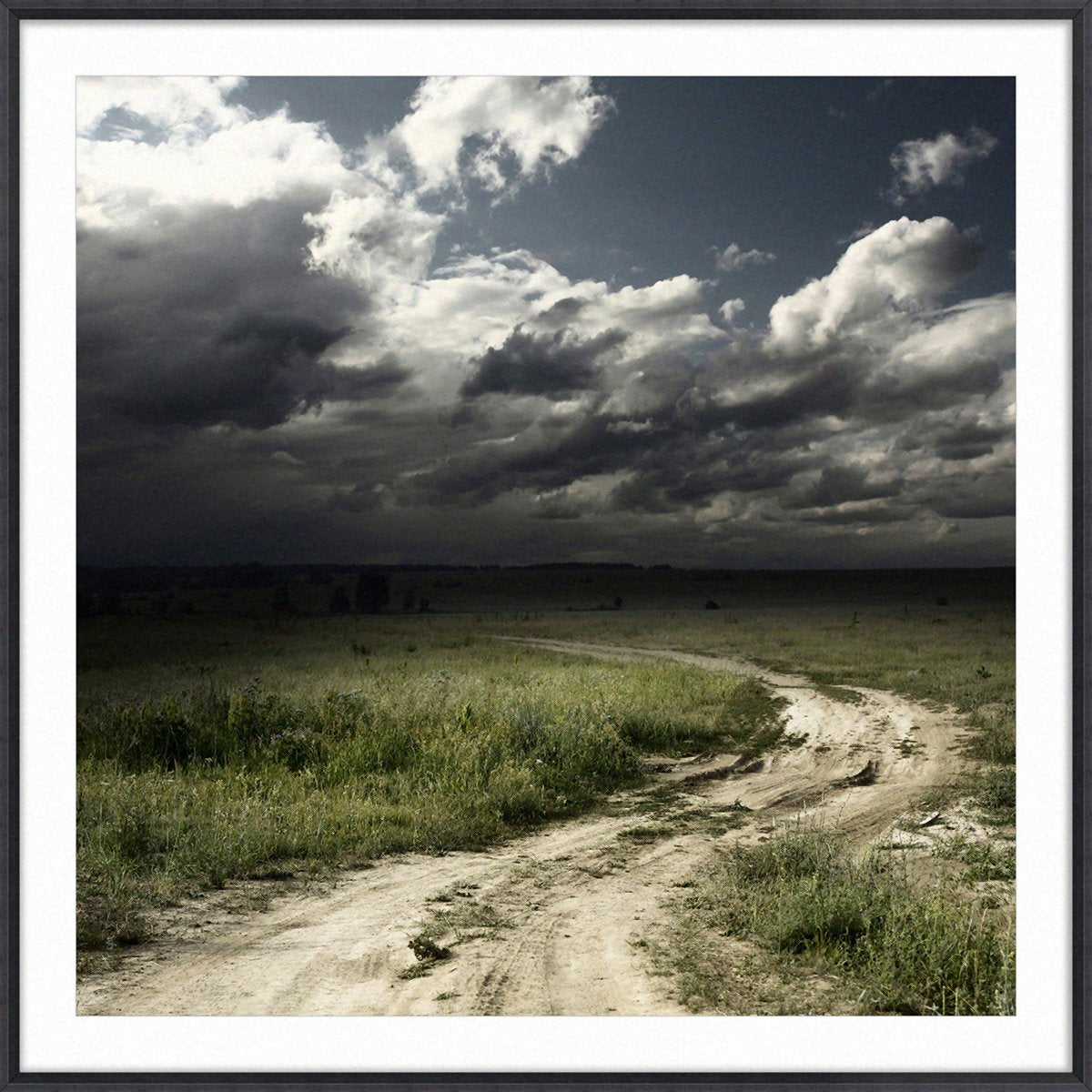 Road In Field With Stormy Clouds